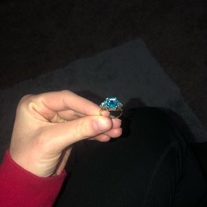 (price is negotiable)BLUE TOPAZ & GOLD BAND RING
